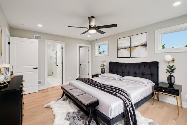 2700 Fontana Dr, Glenview, IL 60025 - bedroom featuring light wood-style flooring, recessed lighting, ceiling fan, and ensuite bath