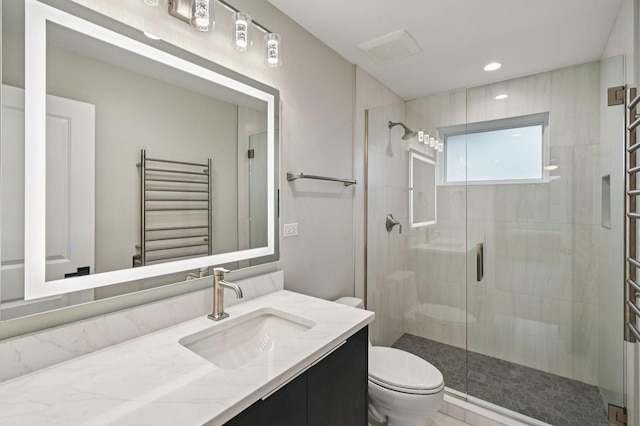 2700 Fontana Dr, Glenview, IL 60025 - bathroom with a towel warming rack, radiator heating unit, vanity, a shower stall, and recessed lighting