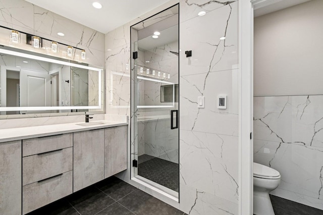 2700 Fontana Dr, Glenview, IL 60025 - bathroom with tile walls, vanity, a marble finish shower, recessed lighting, and tile patterned flooring