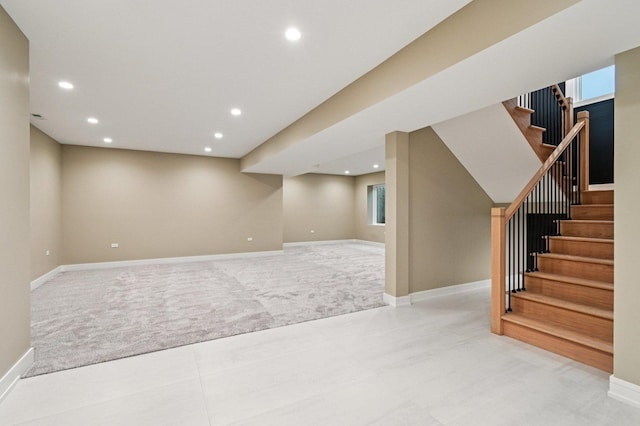 2700 Fontana Dr, Glenview, IL 60025 - basement featuring light carpet, stairway, and recessed lighting