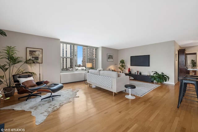 1325 N State Pkwy Unit 7A, Chicago, IL 60610 - living room featuring light wood-style floors and baseboards