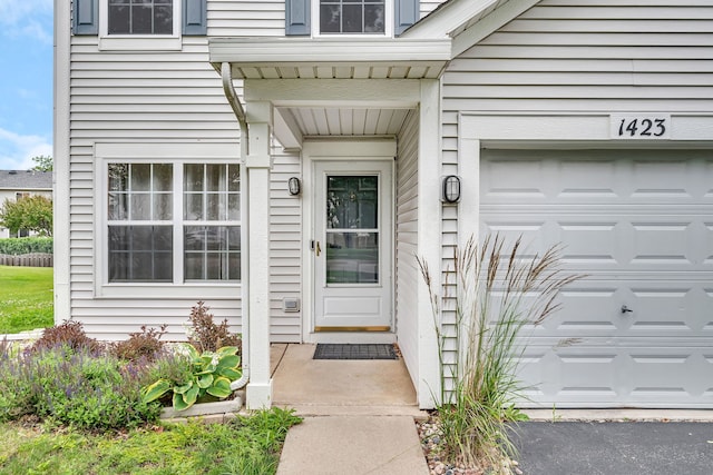 1423 Red Top Ln, Minooka, IL 60447 - doorway to property featuring an attached garage