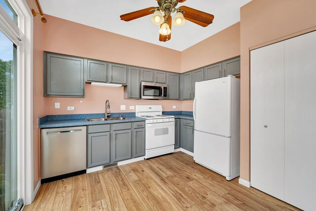 1423 Red Top Ln, Minooka, IL 60447 - kitchen with appliances with stainless steel finishes, gray cabinets, light wood-style flooring, ceiling fan, and dark countertops