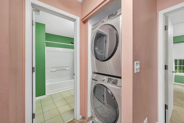 1423 Red Top Ln, Minooka, IL 60447 - washroom with stacked washer and clothes dryer and tile patterned flooring