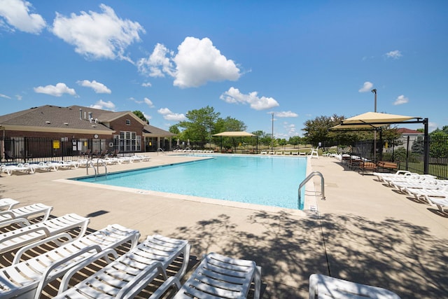1423 Red Top Ln, Minooka, IL 60447 - community pool featuring a patio area