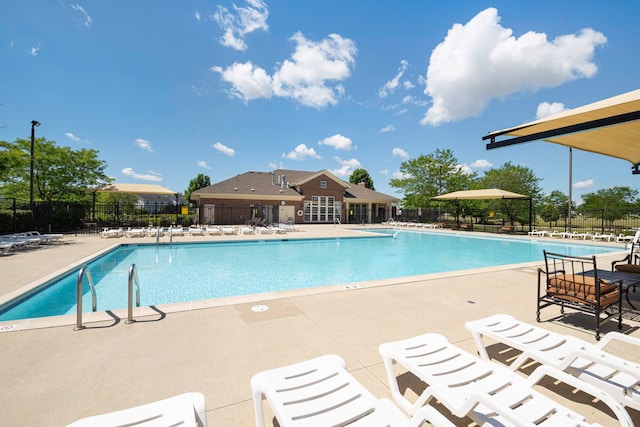 1423 Red Top Ln, Minooka, IL 60447 - community pool featuring a patio