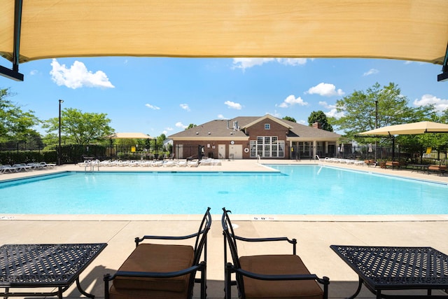 1423 Red Top Ln, Minooka, IL 60447 - community pool featuring a patio