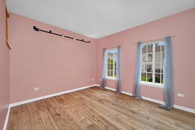 1423 Red Top Ln, Minooka, IL 60447 - spare room with wood finished floors and baseboards