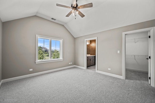 20145 Waterview Trl, Frankfort, IL 60423 - unfurnished bedroom with vaulted ceiling, light carpet, a spacious closet, connected bathroom, and a closet