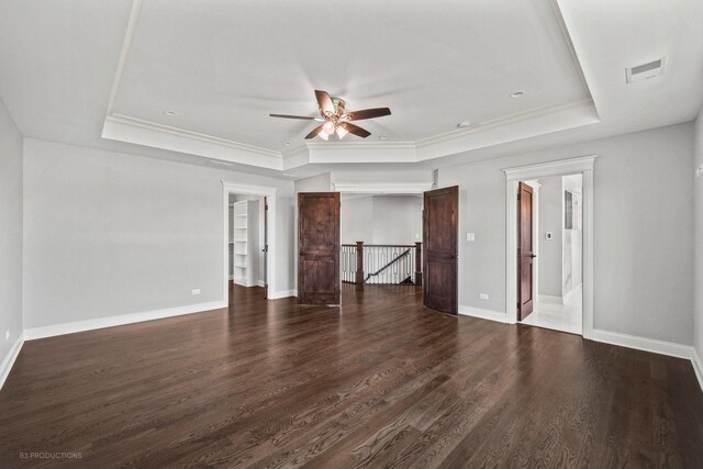 20145 Waterview Trl, Frankfort, IL 60423 - empty room with a raised ceiling, ceiling fan, wood finished floors, and crown molding
