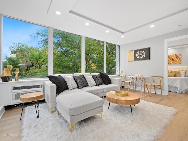 1455 N Sandburg Ter Unit 209B, Chicago, IL 60610 - living area featuring recessed lighting, a wall unit AC, and wood finished floors