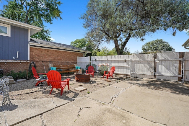 4301 Barry Ln, Oak Forest, IL 60452 - view of patio / terrace featuring an outdoor fire pit and a gate
