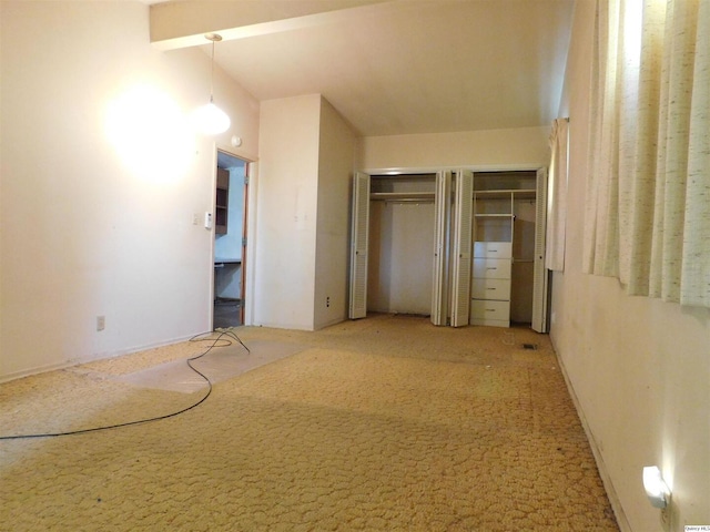 3411 Payson Rd, Quincy, IL 62305 - unfurnished bedroom with multiple closets and carpet flooring