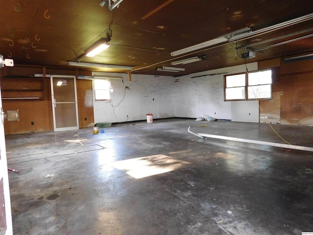3411 Payson Rd, Quincy, IL 62305 - garage featuring a garage door opener