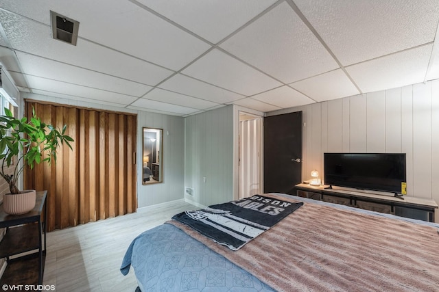 303 W 8th Pl, Hobart, IN 46342 - bedroom featuring a paneled ceiling and wood finished floors