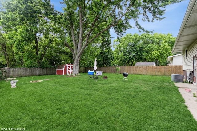 303 W 8th Pl, Hobart, IN 46342 - fenced backyard featuring a storage unit