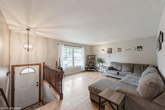 303 W 8th Pl, Hobart, IN 46342 - living area with wood finished floors and a chandelier