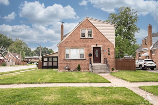 9156 S Sawyer Ave, Evergreen Park, IL 60805 - view of front facade featuring brick siding and a chimney