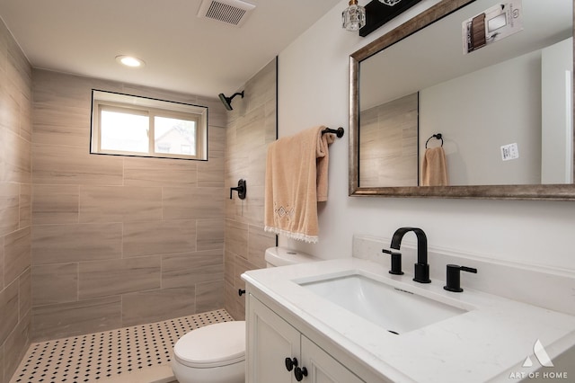 9156 S Sawyer Ave, Evergreen Park, IL 60805 - bathroom featuring vanity, a tile shower, and recessed lighting