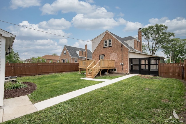9156 S Sawyer Ave, Evergreen Park, IL 60805 - back of house featuring a sunroom, a fenced backyard, a deck, brick siding, and a chimney