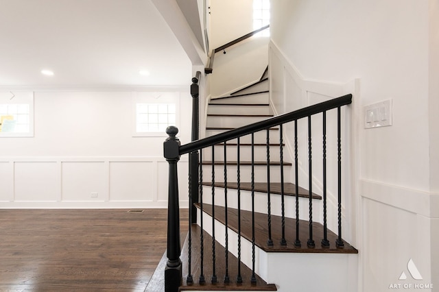 9156 S Sawyer Ave, Evergreen Park, IL 60805 - stairs with a decorative wall, wood finished floors, wainscoting, and recessed lighting
