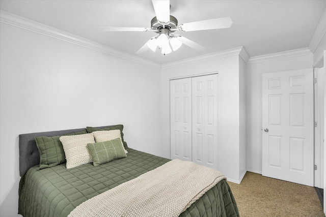 1901 Sumac Dr, Champaign, IL 61821 - bedroom featuring a closet, carpet floors, ornamental molding, and a ceiling fan