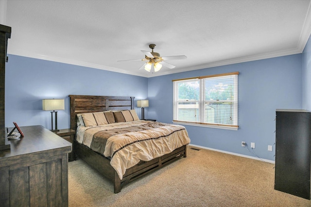 1901 Sumac Dr, Champaign, IL 61821 - carpeted bedroom with ornamental molding and a ceiling fan