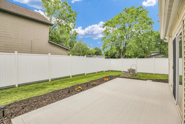 1901 Sumac Dr, Champaign, IL 61821 - fenced backyard featuring a patio area