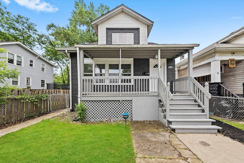 47 W 124th St, Chicago, IL 60628 - view of front of property with covered porch and stairway