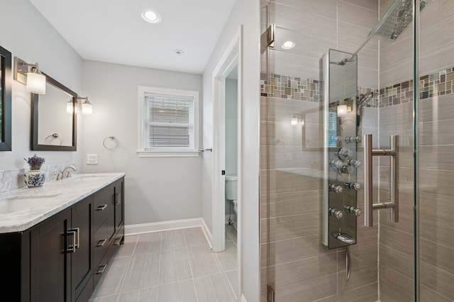 806 S Walnut Ave, Arlington Heights, IL 60005 - bathroom with double vanity, a stall shower, and recessed lighting