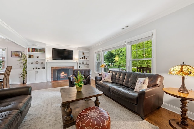 806 S Walnut Ave, Arlington Heights, IL 60005 - living area with healthy amount of natural light, ornamental molding, wood finished floors, a brick fireplace, and built in features
