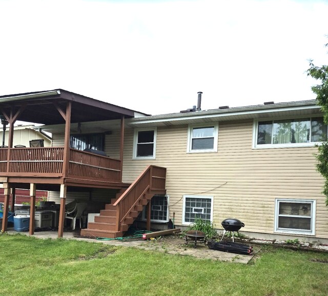 3208 172nd Ct, Hazel Crest, IL 60429 - back of property with a lawn, stairway, and a wooden deck