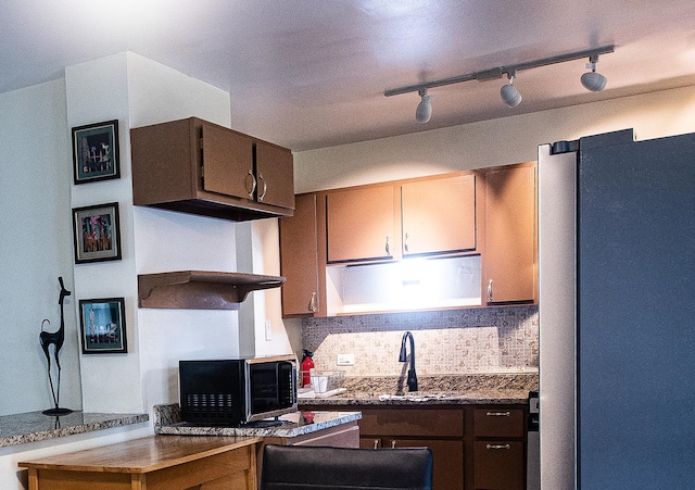 3208 172nd Ct, Hazel Crest, IL 60429 - kitchen with freestanding refrigerator, backsplash, and track lighting