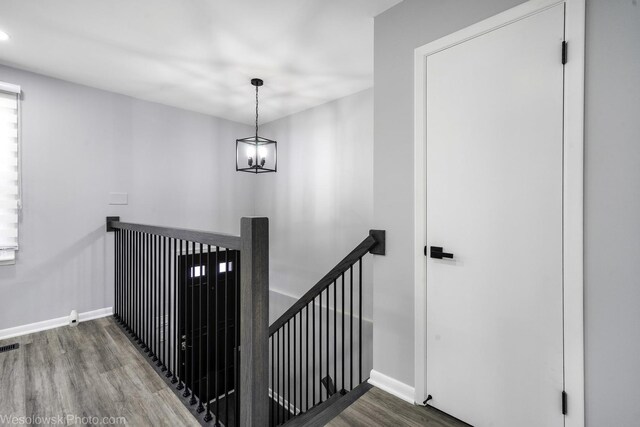 651 Clearmont Dr, Elk Grove Village, IL 60007 - staircase featuring baseboards and wood finished floors
