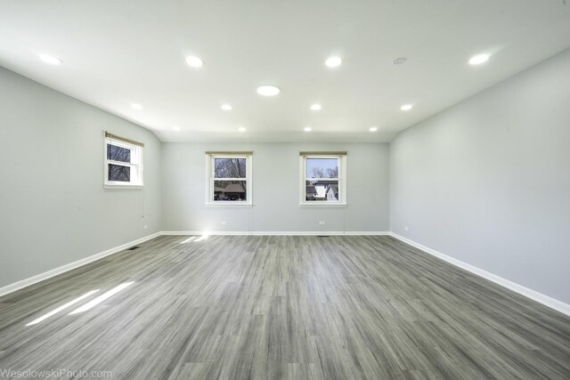 651 Clearmont Dr, Elk Grove Village, IL 60007 - spare room with recessed lighting and wood finished floors