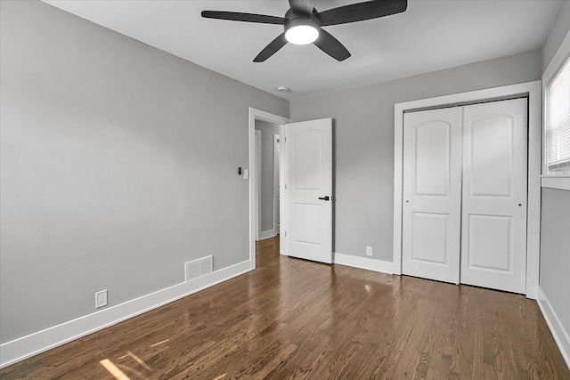 9007 S Cregier Ave, Chicago, IL 60617 - unfurnished bedroom with wood finished floors, a closet, and ceiling fan