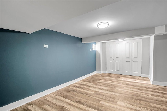 9007 S Cregier Ave, Chicago, IL 60617 - finished basement featuring light wood-style floors and baseboards