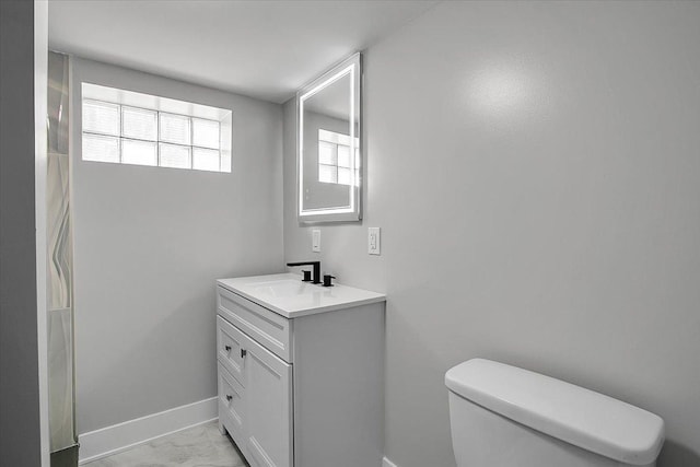 9007 S Cregier Ave, Chicago, IL 60617 - bathroom with vanity and marble look tiles