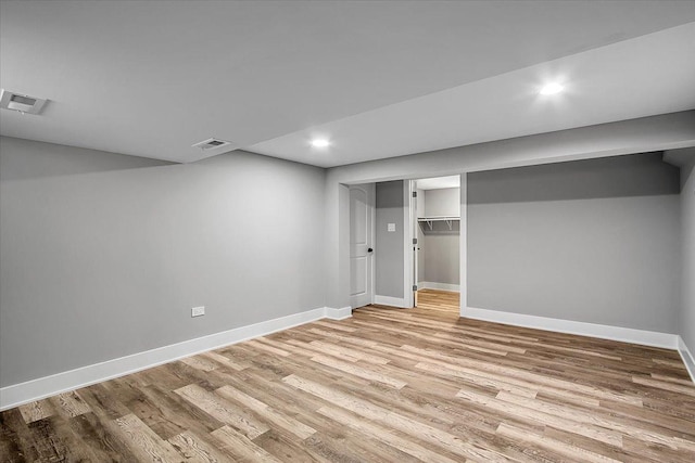 9007 S Cregier Ave, Chicago, IL 60617 - finished basement featuring light wood-type flooring and recessed lighting