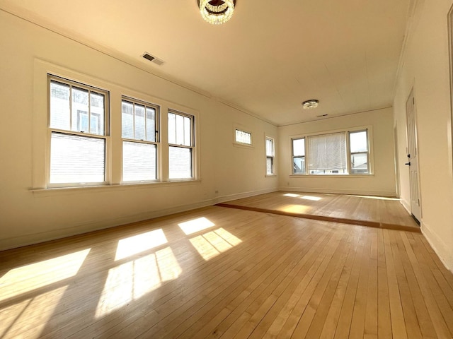 1321 E Ave, Berwyn, IL 60402 - empty room featuring light wood-style flooring and baseboards