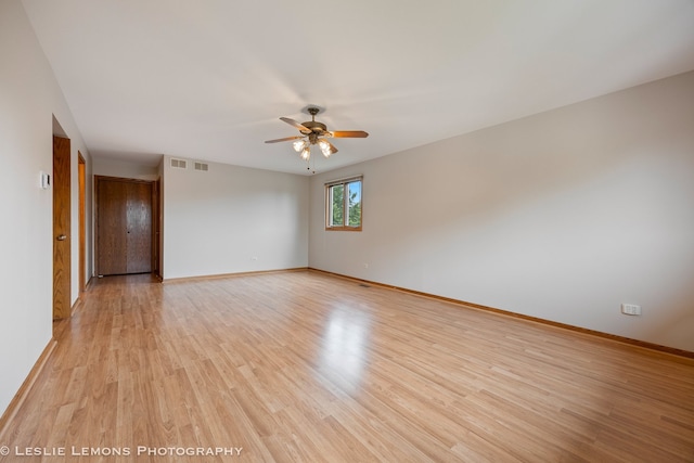 13938 S Trails End Dr, Homer Glen, IL 60491 - empty room with a ceiling fan and light wood finished floors