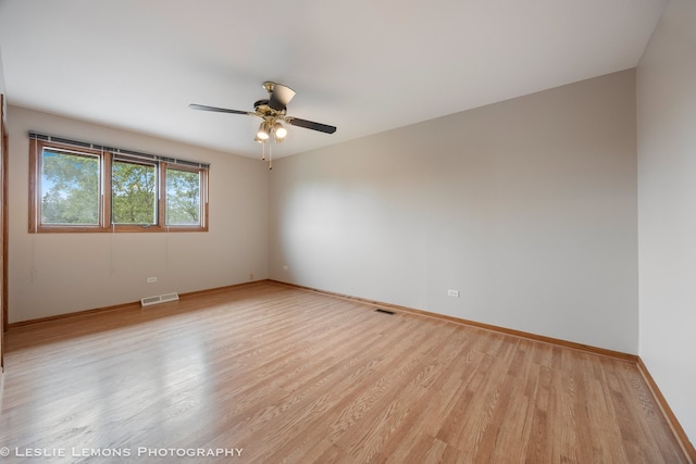 13938 S Trails End Dr, Homer Glen, IL 60491 - empty room featuring light wood-type flooring and a ceiling fan