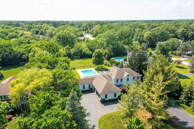 2135 Kenton Ln, Libertyville, IL 60048 - aerial view of property and surrounding area featuring a pool area and a forest