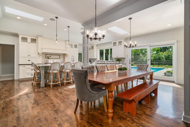2135 Kenton Ln, Libertyville, IL 60048 - dining room with a chandelier, a skylight, ornamental molding, dark wood-style floors, and recessed lighting
