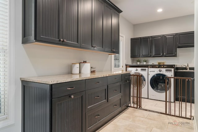 2135 Kenton Ln, Libertyville, IL 60048 - washroom featuring washing machine and dryer, cabinet space, light tile patterned flooring, and recessed lighting