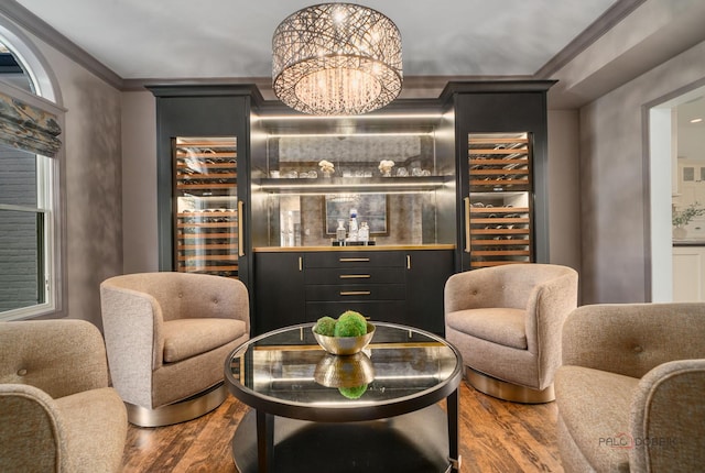 2135 Kenton Ln, Libertyville, IL 60048 - wine area featuring wood finished floors, crown molding, a community bar, a chandelier, and beverage cooler