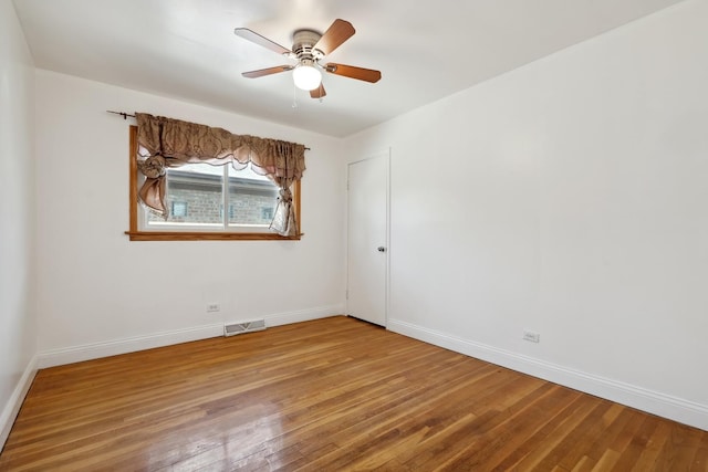 3781 W 76th St, Chicago, IL 60652 - spare room with wood finished floors and ceiling fan