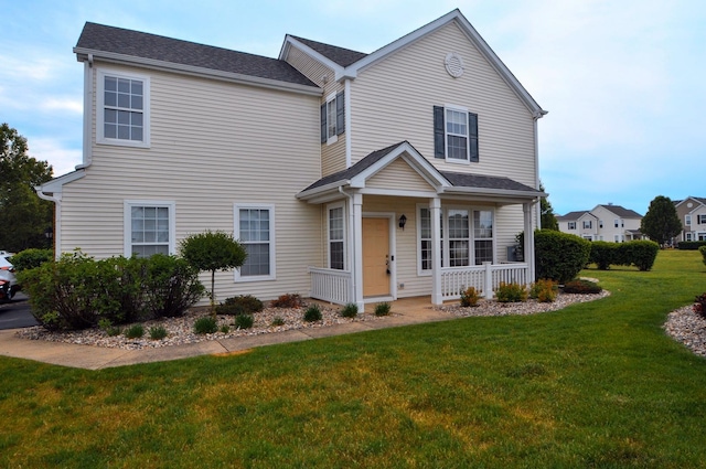 24952 Clare Cir, Manhattan, IL 60442 - view of front facade with a front lawn and covered porch