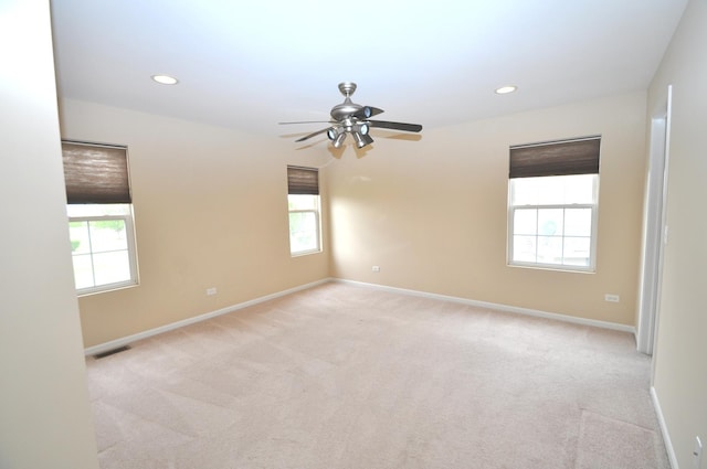 24952 Clare Cir, Manhattan, IL 60442 - unfurnished room featuring healthy amount of natural light, light carpet, a ceiling fan, and recessed lighting