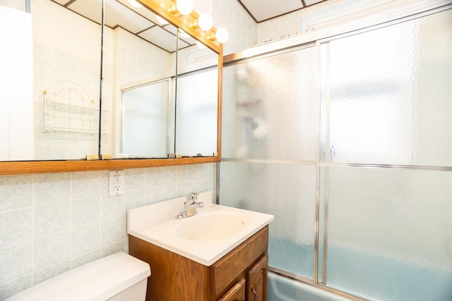 5028 N Sawyer Ave, Chicago, IL 60625 - full bath with vanity, tile walls, enclosed tub / shower combo, and decorative backsplash